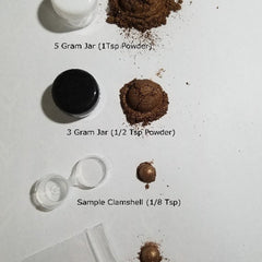 Side view of Ghost Eye Shadow palette showing matte and shimmer shades in cool-toned grays and silvers