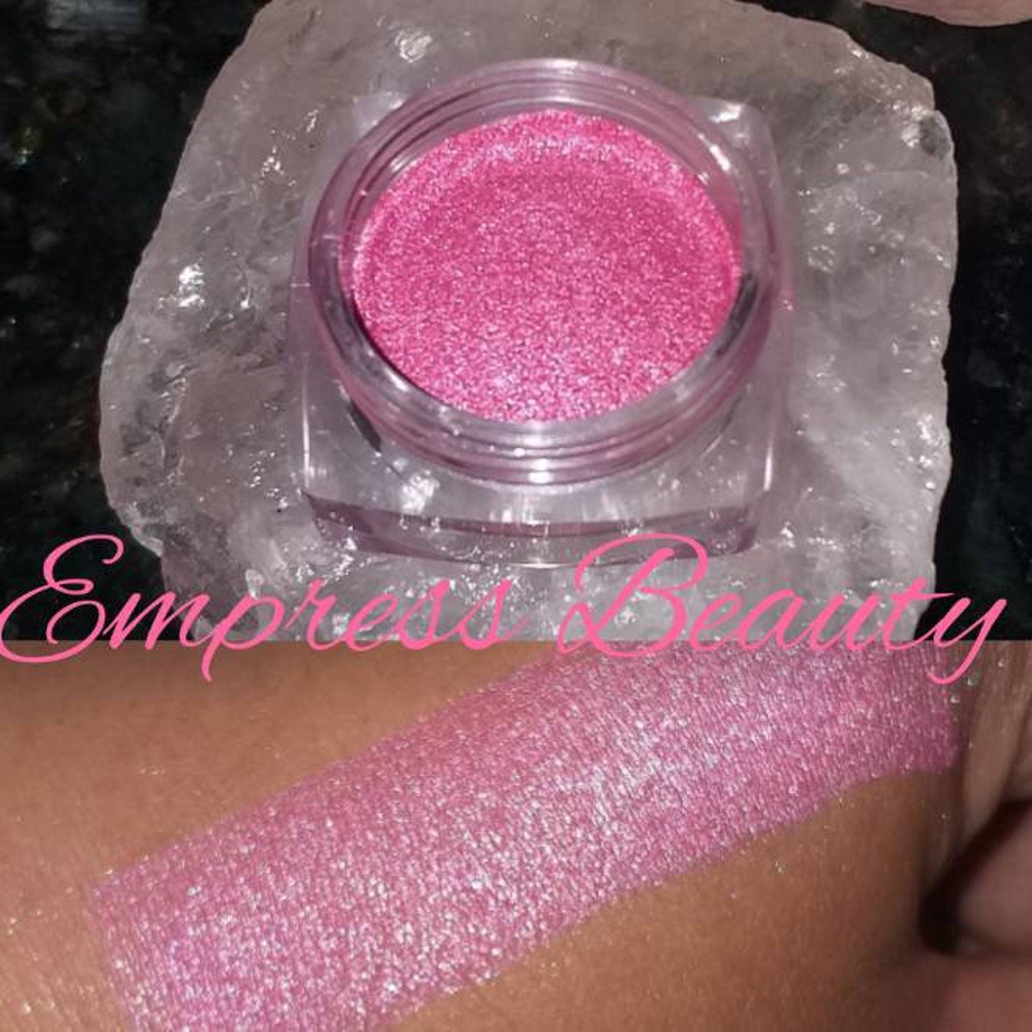 Eyeshadow pink shimmer jar and swatch, Empress Beauty brand visible