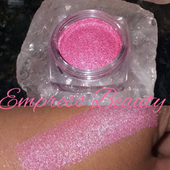 Eyeshadow pink shimmer jar and swatch, Empress Beauty brand visible