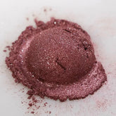 Close-up of Cinnamon Kiss Eye Shadow compact showing warm copper powder with satin finish