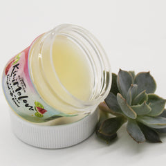 Lip mask jar with clear glass, white lid, and Kiwi Melon label visible