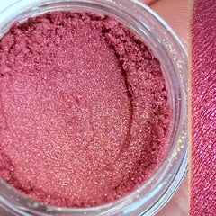 Close-up of Rockstar vegan eyeshadow palette showing shimmering silver and charcoal shades in compact case