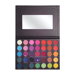 Eyeshadow palette with mirror, black case, and colorful eyeshadows for makeup