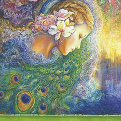 Side view of peacock-inspired eyeshadow palette showing vibrant blue and green shades in sleek black compact