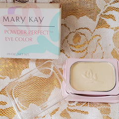 Mary Kay eye color compact in pink and clear case on patterned background
