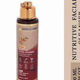 Facial cleanser bottle brown and gold with Roots & Herbs text and label details