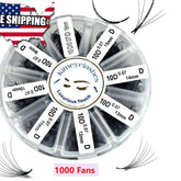 False eyelashes black wispy fans in clear container with Kimeyelashes brand name