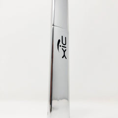 Metallic silver bottle with black logo on white background.