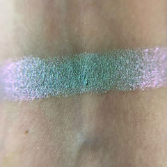 Side view of Fairy Frog palette showing 12 vibrant matte and shimmer eyeshadows in rainbow hues with mirrored compact