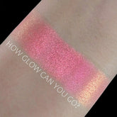Eye makeup multi chrome eyeshadow swatches in pink and gold, on skin, Chromadescent text visible