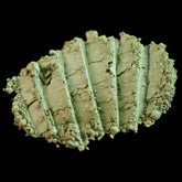 Matte sage green loose mineral eyeshadow in a small jar with gold lid, showcasing the Withered Garden olive shade.