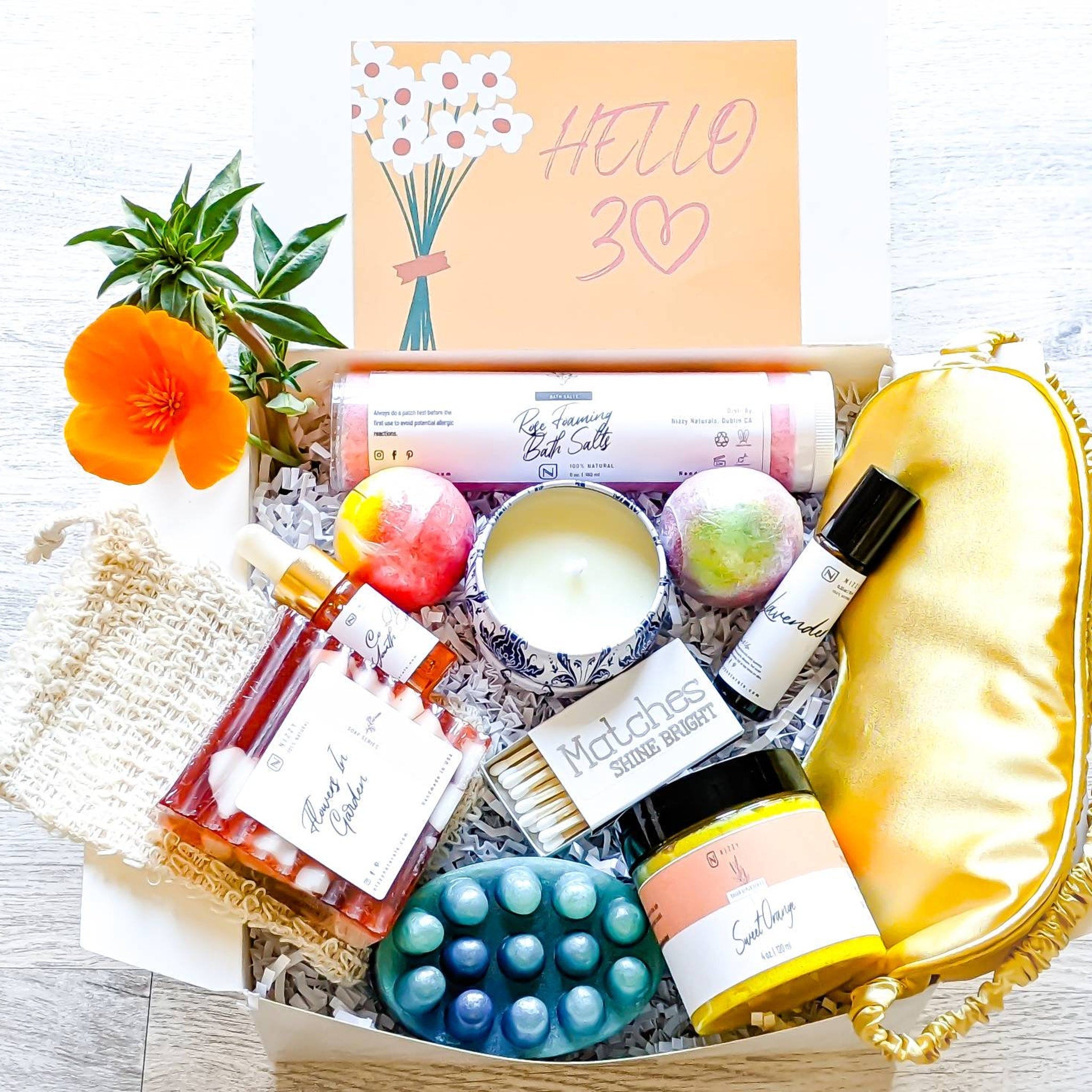 30th Birthday Gift Box with white box, orange flower, and Nizzy Naturals products