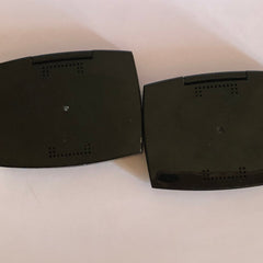 Close-up of LANCÔME x Alber Elbaz taupe eyeshadow palette with shimmering metallic finish and embossed logo