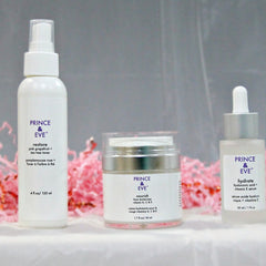 Skincare set with white bottles, silver accents, and "PRINCE & EVE" brand text visible