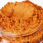 Whiskey copper gold metallic eyeshadow in a sifter jar with vegan shimmer mineral makeup