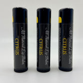Lip balm tubes with black, yellow, and white text, Citrus flavor, Levs Naturals brand