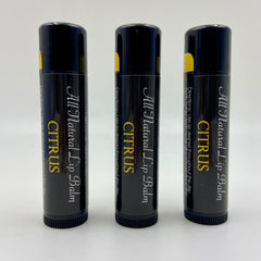 Lip balm tubes with black, yellow, and white text, Citrus flavor, Levs Naturals brand