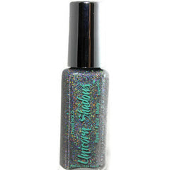 Glitter eyeshadow bottle with black cap, silver glitter, and Unicorn Shadows text
