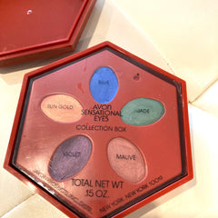 Side view of Avon Sensational Eyes Vintage Collection Box showcasing stacked eye shadow pans in neutral tones