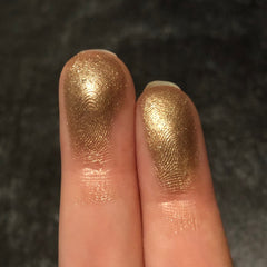 Side view of Mercury Single Eye Shadow compact showing matte taupe powder and sleek black case design