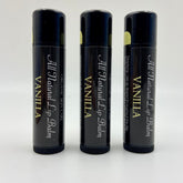 Lip balm tubes in black with vanilla text and yellow accent, Levs Naturals brand