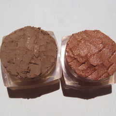 Close-up of three autumn-inspired mineral eyeshadows in bronze, copper, and gold shimmer with vegan formula