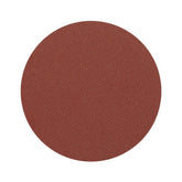 Eyeshadow pan, matte reddish-brown color, pressed texture, circular shape