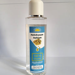 Hydrolate bottle with clear liquid, white cap, and blue label with text "NOVI DAN" and "Hydrolate