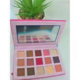 Eyeshadow palette with pink, purple, and brown shades, Moira Beauty brand, open for use