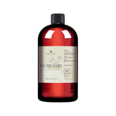Tea Tree Water toner bottle, red glass, black cap, OPO brand label