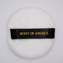Powder puff, white round with black band, "BODY OF ANGELS" text in gold lettering