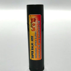 Lip balm tube, black plastic, Super Balm label with text and graphics