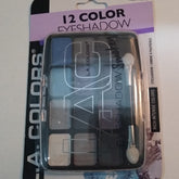 Open compact displaying 12 vibrant eye shadow shades in matte and shimmer finishes with dual-ended applicator