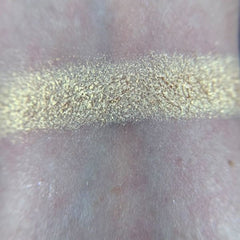 Side view of Magic Dance Eye Shadow Palette showing twelve vibrant matte and shimmer shades in circular pans