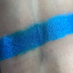 Side view of Luna Eye Shadow palette showing soft pink and taupe shades with satin finish in sleek black compact