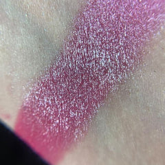 Side view of Razzmatazz Eye Shadow Palette showcasing 12 vibrant matte and shimmer shades in a sleek black compact