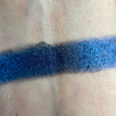 Close-up of the Helpless Eye Shadow Palette showing six matte and shimmer shades in warm neutrals and deep plum tones