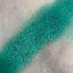 Side view of Winifred Eye Shadow Palette showcasing twelve vibrant matte and shimmer shades in sleek black compact