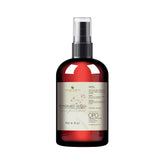 Toner bottle with red glass, black sprayer, and white label showing brand name