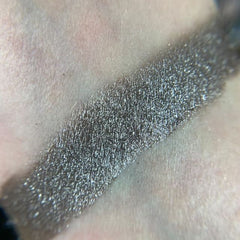 Close-up of Zbornak Eye Shadow Palette showing six matte and shimmer shades in warm bronze and taupe tones