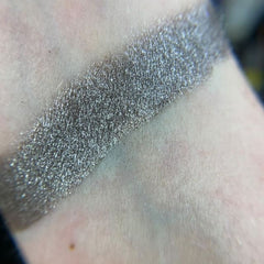 Side view of Zbornak Eye Shadow Palette showcasing matte and shimmer shades in warm bronze and mauve tones