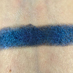 Side view of Helpless Eye Shadow Palette showcasing matte and shimmer shades in warm browns and golds