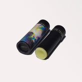Lip balm tubes, black and patterned paper tubes, with visible lip balm, GarageCats brand