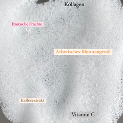 White foamy bubbles with text labels "Exotische Früchte", "Kaffeeextrakt", and "Vitamin C
