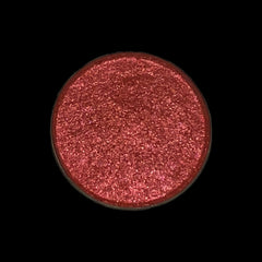 Eyeshadow, red glittery powder in round compact, cosmetic product