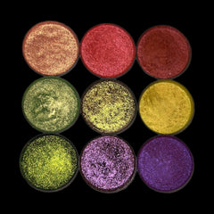 Close-up of vegan duo chrome eyeshadow pan showing shimmering pink and gold shift in natural light