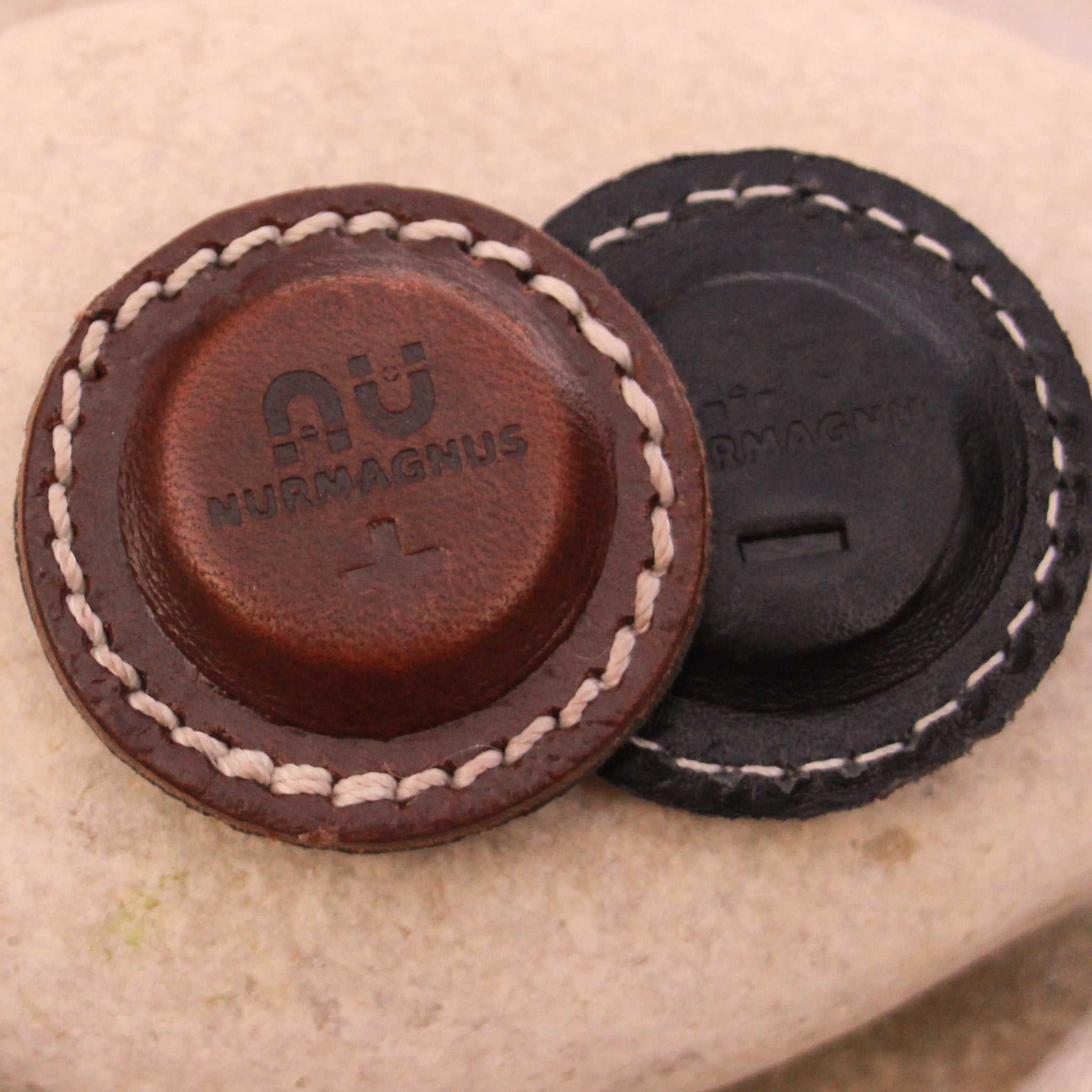 Magnets leather brown and black with white stitching Nurmagnus brand