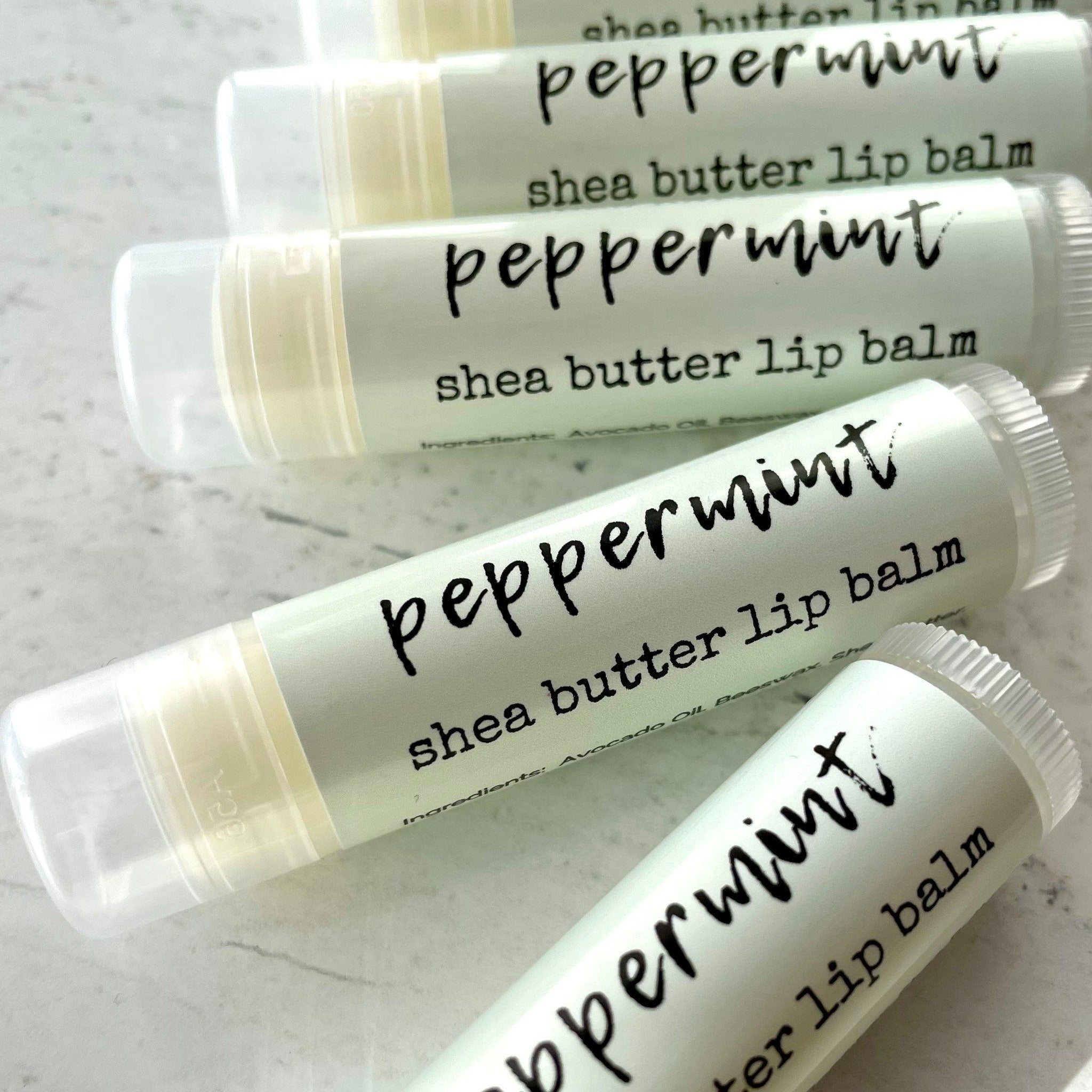 Lip balm tubes, white with black text, clear cap, CozySloth peppermint label