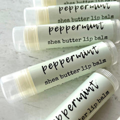 Lip balm tubes, white with black text, clear cap, CozySloth peppermint label