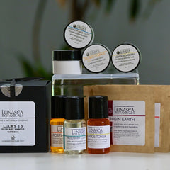 Skin care sample box with black box, skincare bottles, and brand name Lunasea Botanicals